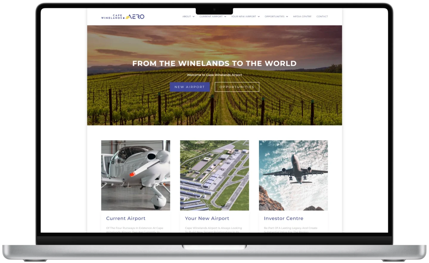 Cape Winelands Airport website in a notebook mockup