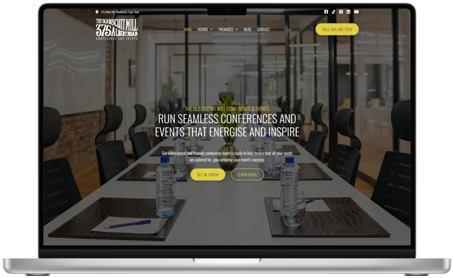 The Old Biscuit Mill Conference and Events Centre website in a notebook mockup